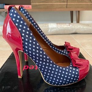 Red patent and navy pumps